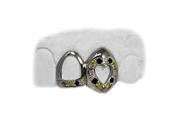 Two teeth with heart and sapphire outline grillz close-up - Luxe Grillz