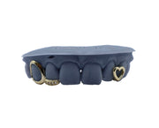 Scoot Henderson smiling with Luxe Grillz – side portrait