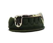 Close-up of Luxe Grillz with intricate gold details and diamond accents