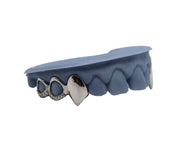 Luxe Grillz photo – bold top and bottom grillz close-up
