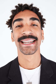 Bridge grillz in mouth – lifestyle shot with polished finish