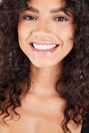 Close-up of gap tooth grillz in mouth – natural lifestyle shot