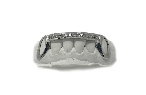 diamond bridge grillz with gold fangs