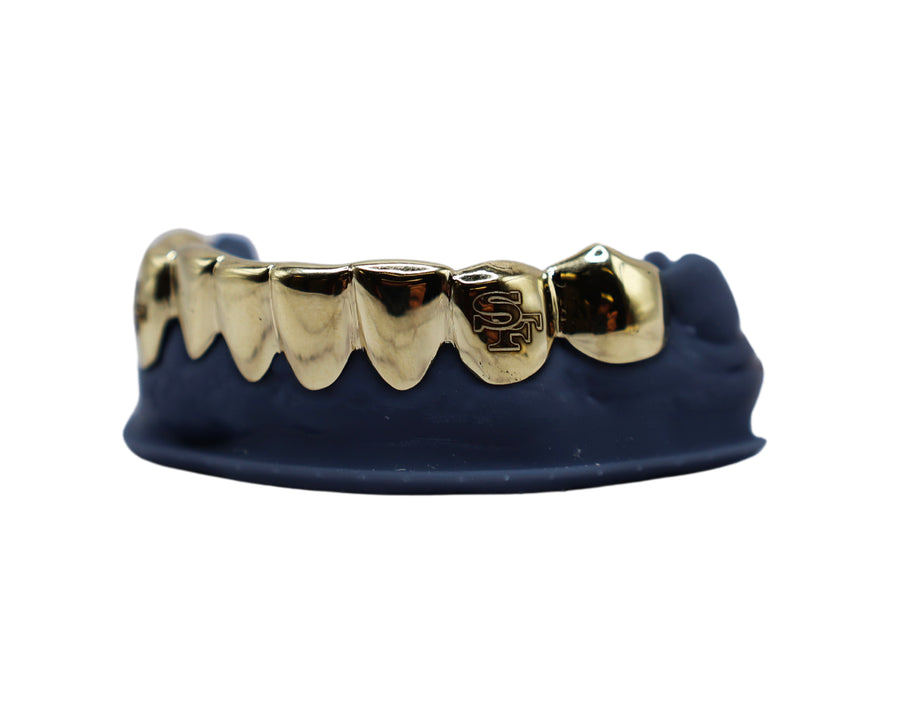 Bottom 8 Grillz w Laser Engraved Fangs Yellow Gold